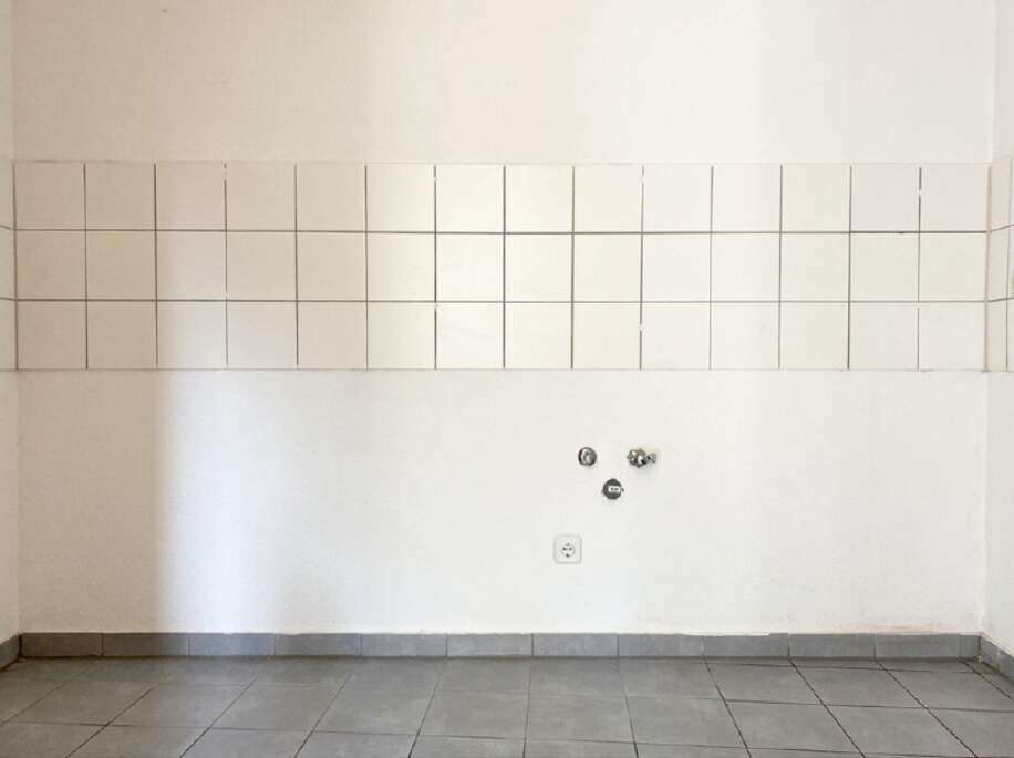 Küche mit Fliesenspiegel